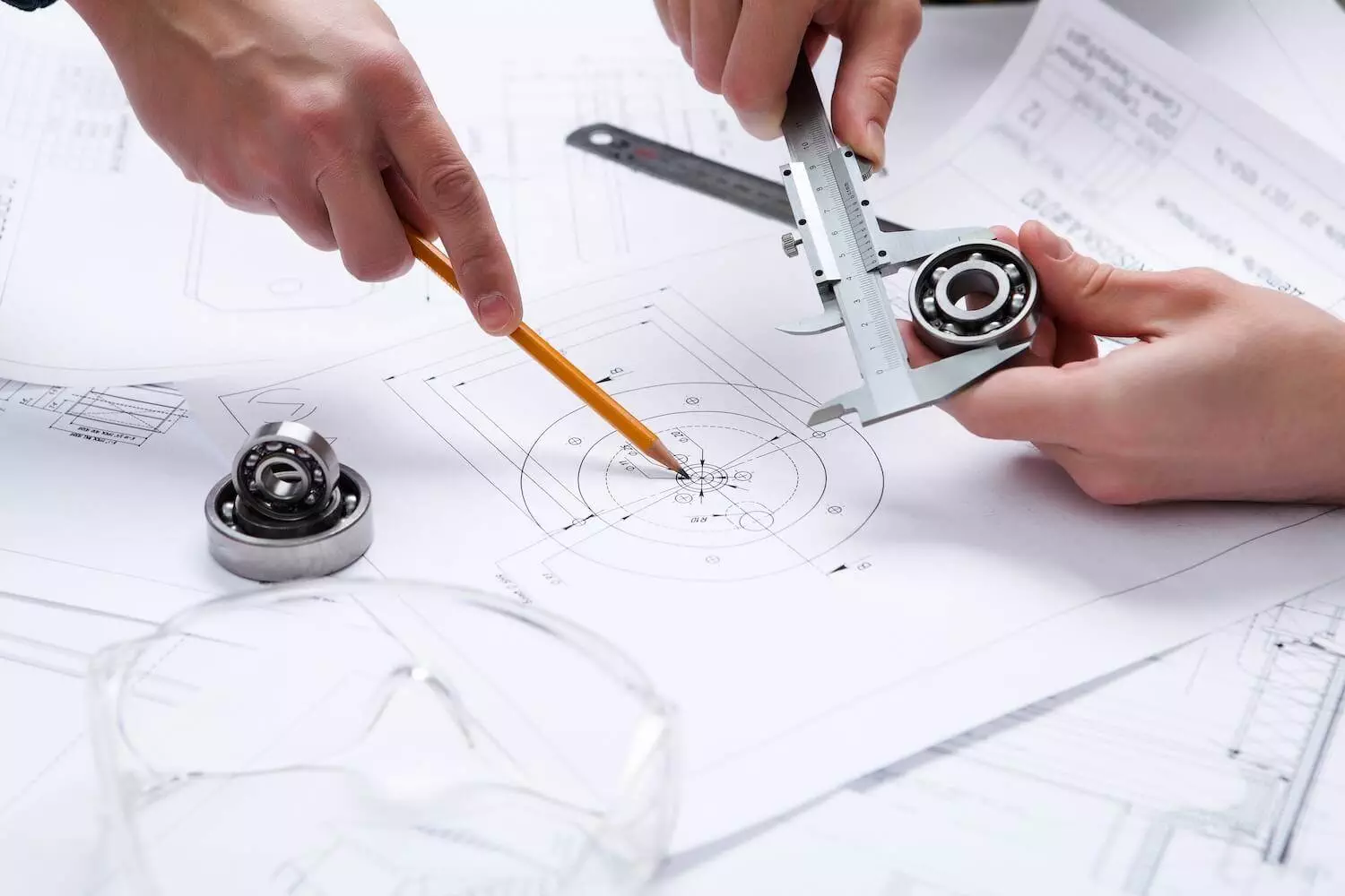 Engineer creating technical piping drawings