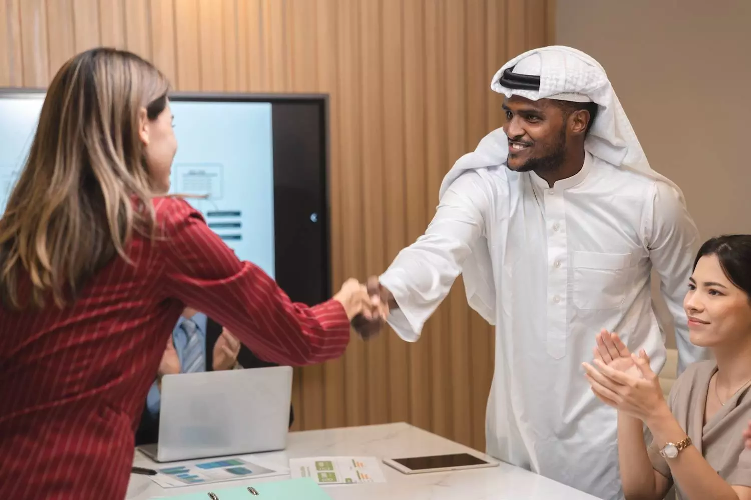 Industrial sales engineer representing manufacturer at international trade fair