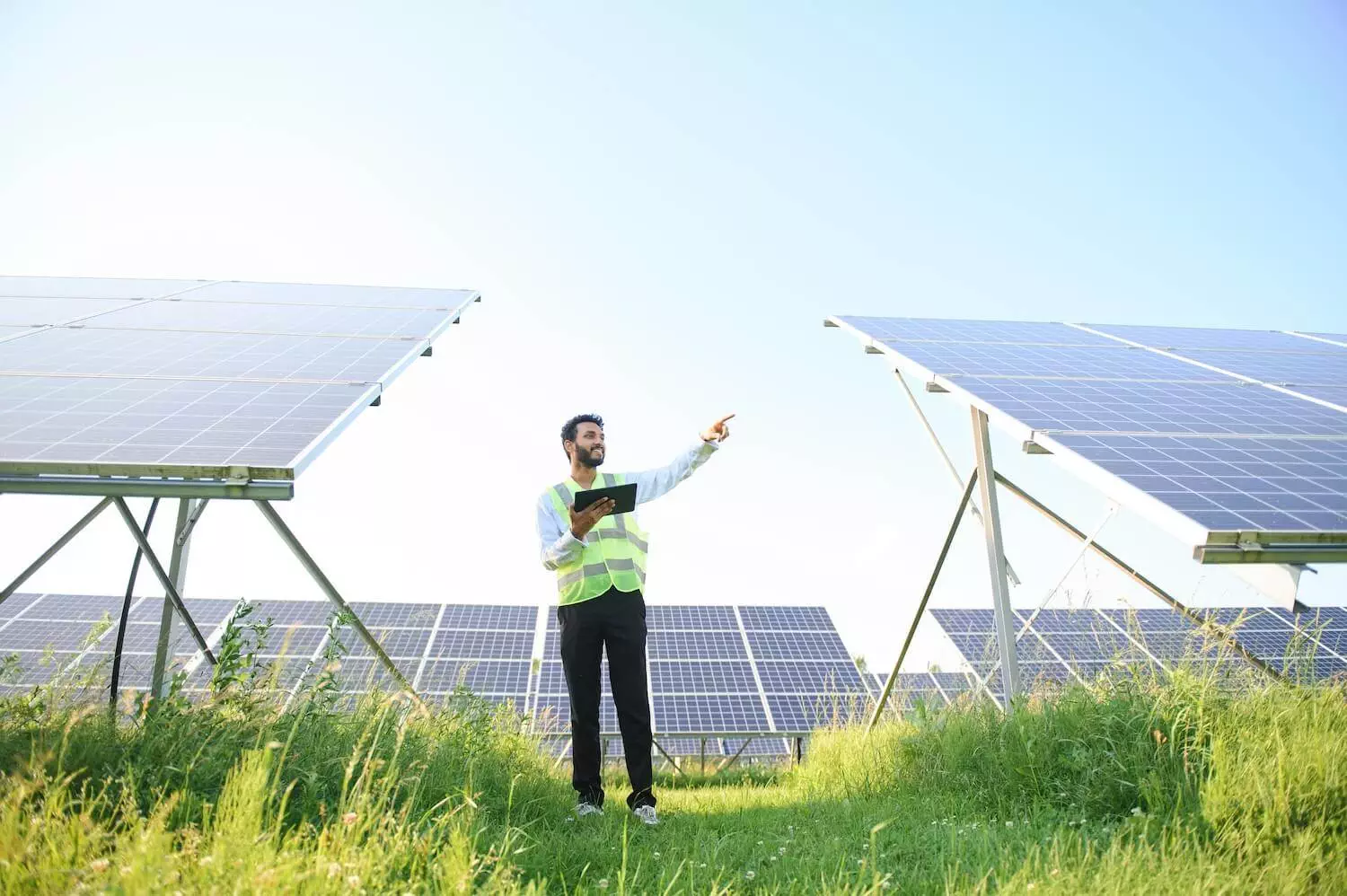 Utility-scale solar panels installed on an open field